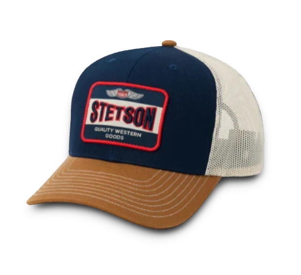 Moon Ridge Hats and Heritage Stetson navy blue trucker cap with tan brim and embroidered Western Wear patch. Mesh back.