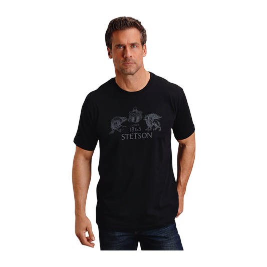 Man wearing a black Moon Ridge Hats and Heritage short-sleeve t-shirt with a Stetson beaver and eagle graphic print. alternate view
