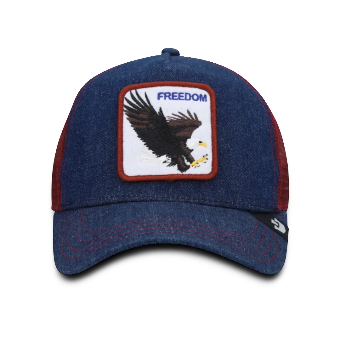 Moon Ridge Hats and Heritage navy denim trucker hat with red mesh back and embroidered eagle patch with "FREEDOM" text.