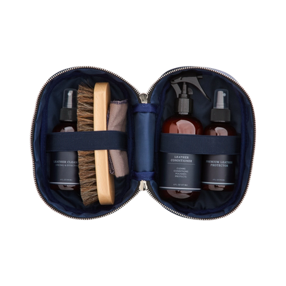 Moon Ridge Hats and Heritage leather care kit in a navy zip-around nylon case with cleaner, conditioner, and brush.