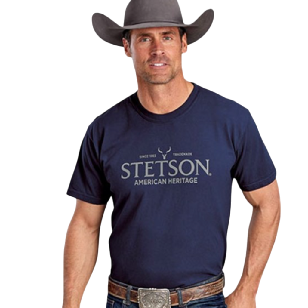 Man wearing a navy Moon Ridge Hats and Heritage Stetson American Heritage crew neck t-shirt and a grey cowboy hat.