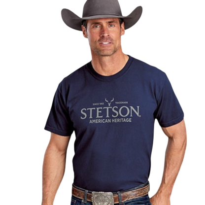 Man wearing a navy Moon Ridge Hats and Heritage Stetson American Heritage crew neck t-shirt and a grey cowboy hat.