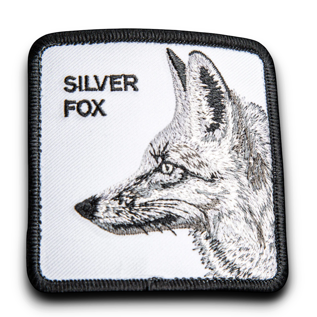 Moon Ridge Hats and Heritage Silver Fox embroidered patch with detailed fox illustration and "SILVER FOX" text.