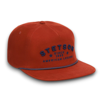 Moon Ridge Hats and Heritage Stetson American Legend baseball cap in burnt orange cotton twill with navy blue embroidery and rope detail.