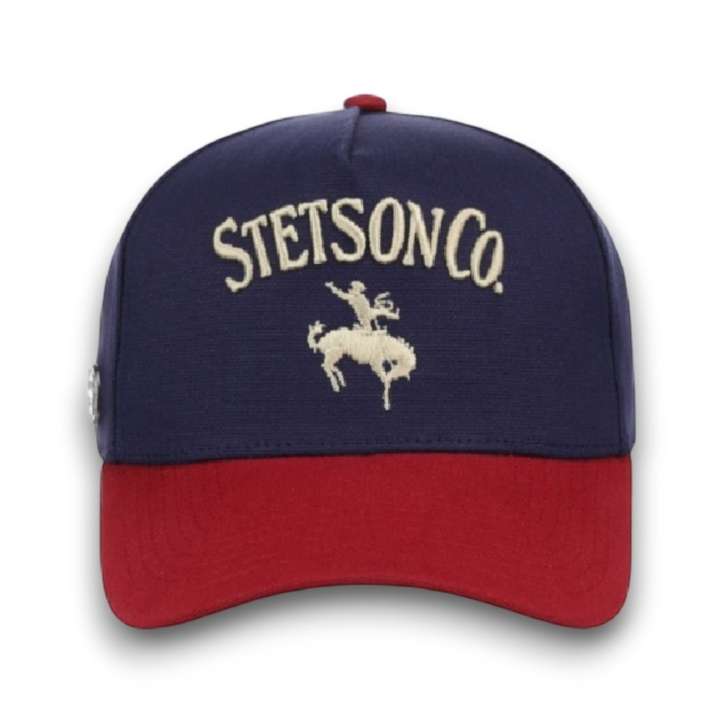 Moon Ridge Hats and Heritage navy baseball cap with red brim and embroidered Stetson Co. logo with rider on bucking bronco.